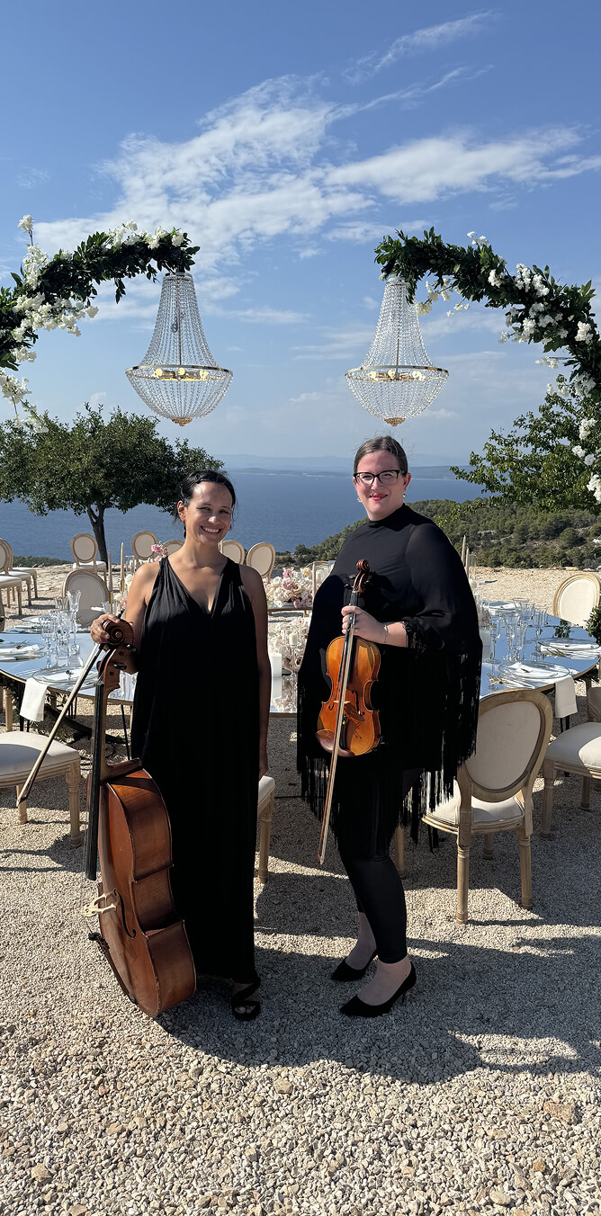 String duo at a wedding in Hvar olive garden