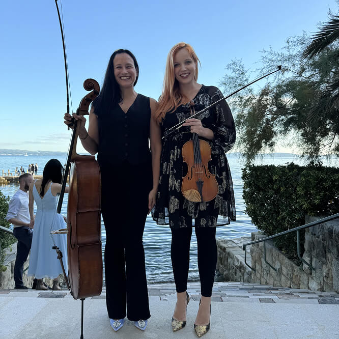 Violin and cello duo at a wedding in Vila Dalmacija, Croatia